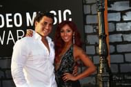 Jionni LaValle and Snooki (Image via Hubert Boesl/ Getty Images)